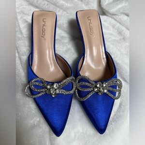 Royal blue with crystal bow slip on heels, size 5.5